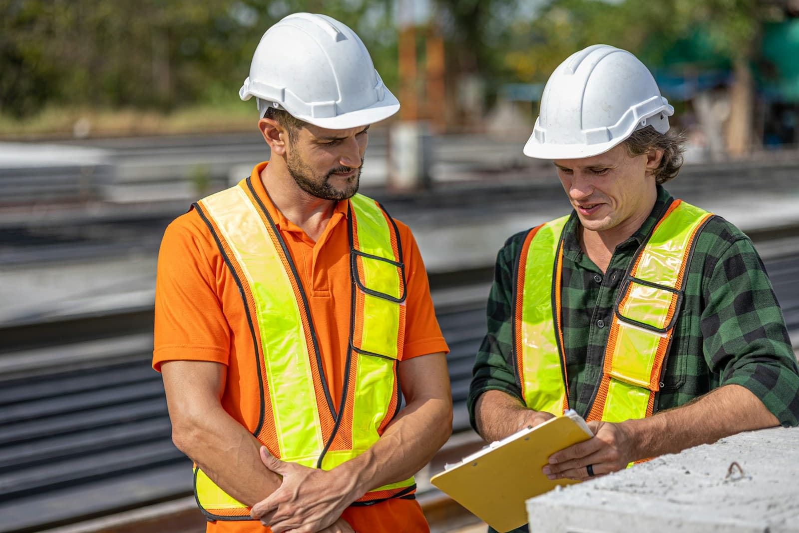 Site engineers coordinating a delivery