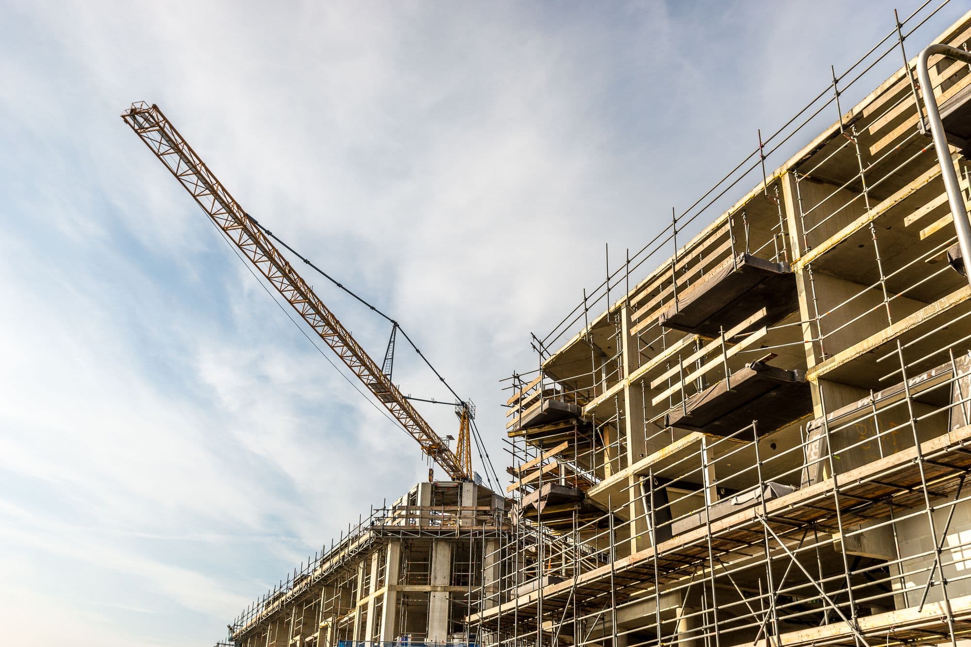 Tower crane and scaffolding on a construction site